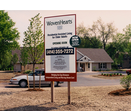 WovenHearts construction sign.